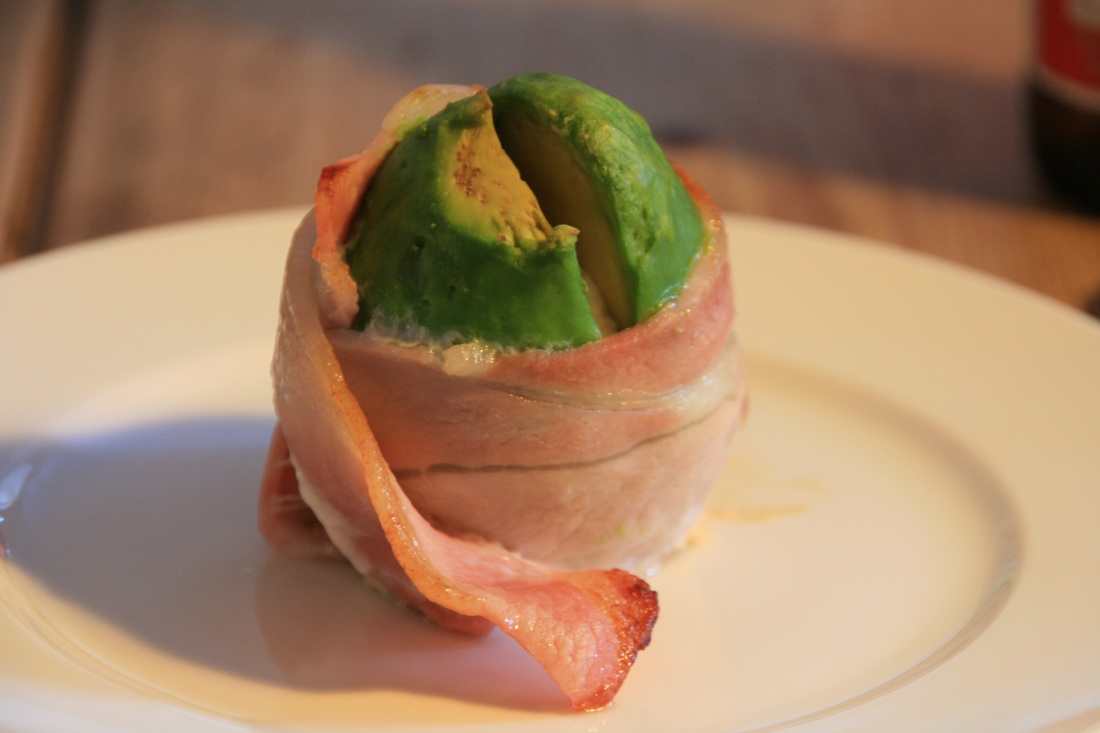Stuffed avocado wrapped in bacon