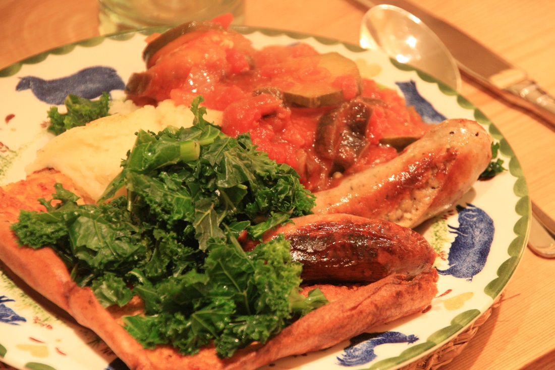 Toad in the hole with ratatouille and kale