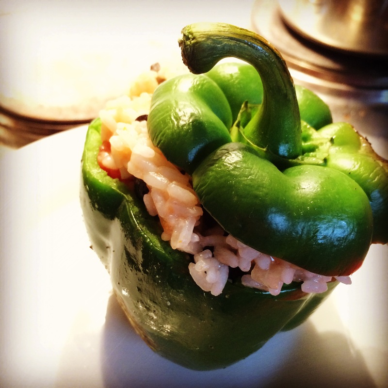 Pepper stuffed with rice, tomato, garlic, onion, olives